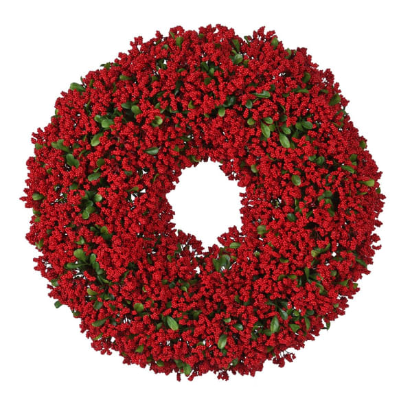 Red wreath with green leaves on a white background