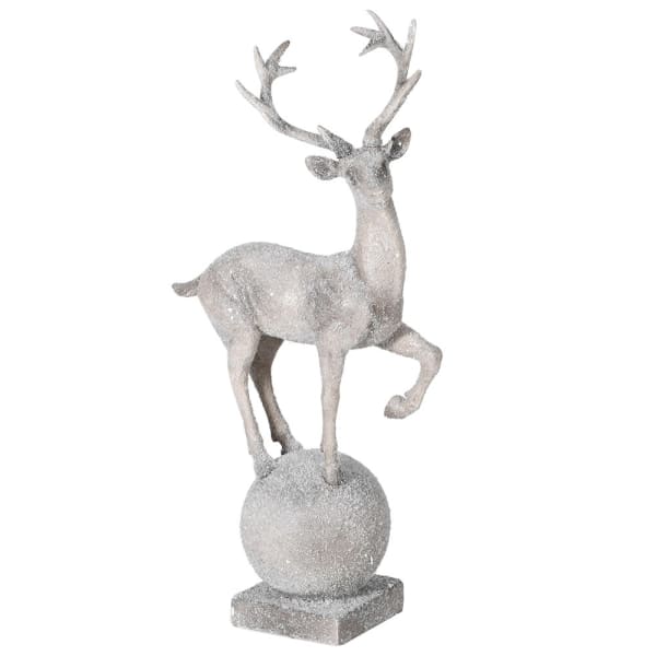 Decorative deer figure on a sphere with a white background