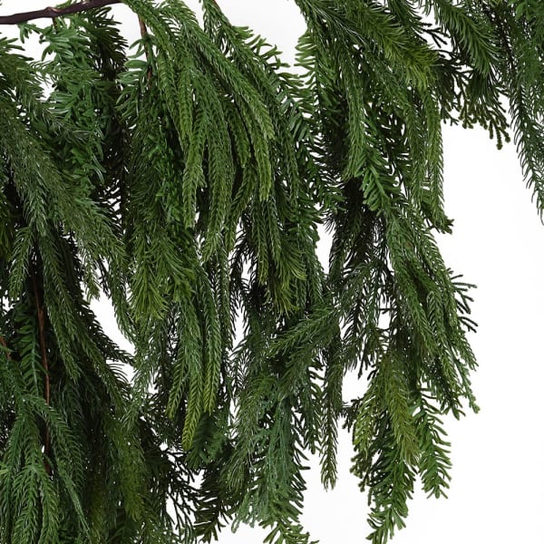 Green artificial Christmas garland on a white background