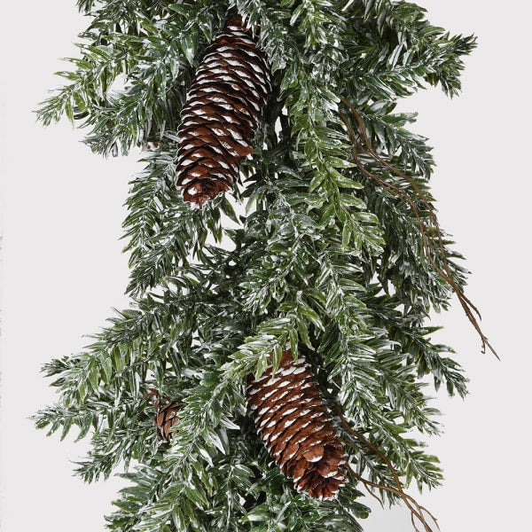 Faux Christmas garland with pinecones on a white background