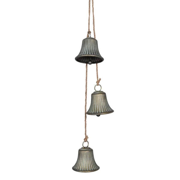Set of three hanging metal bells on a white background