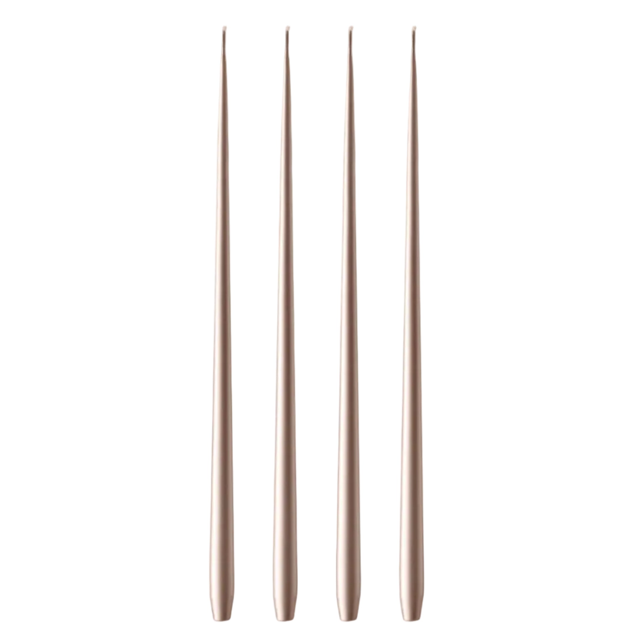 Four slim metallic rose gold tools with tapered ends, arranged vertically side by side on a plain white background.