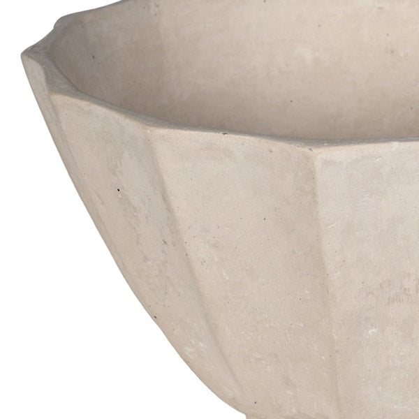 A light beige ceramic planter with a fluted, pedestal base and wide, scalloped rim, shown against a plain white background.