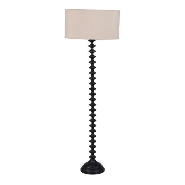 Floor lamp with a black twisted base and beige lampshade on a white background