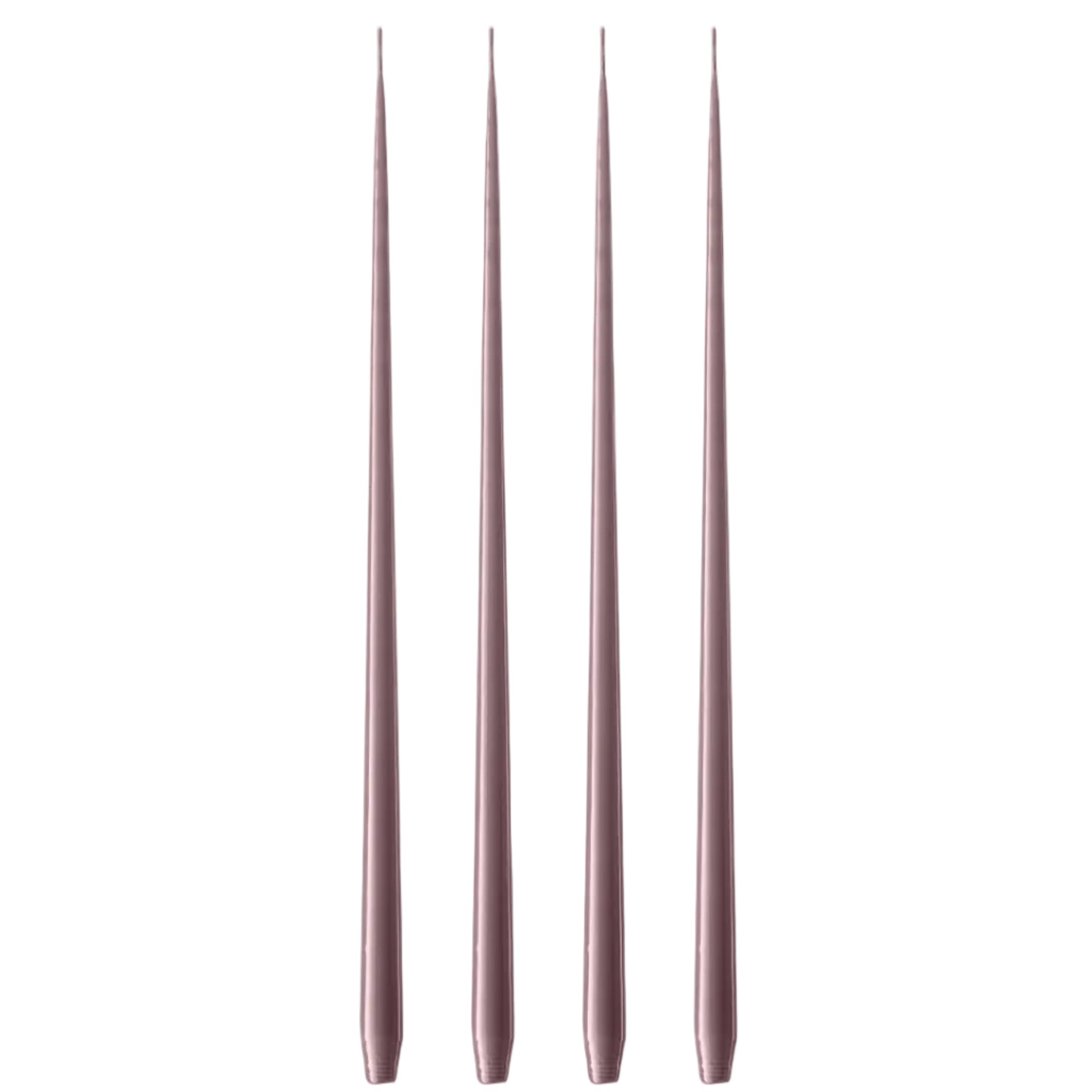 Four slim metallic rose gold taper candles standing upright in a row against a plain white background.